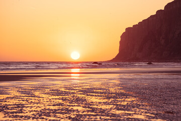 Sunrise on a beach in Speeton, East Yorkshire, UK