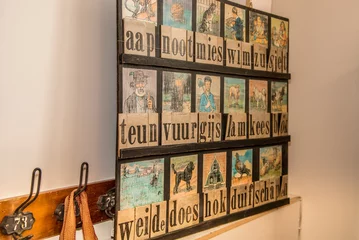 Foto op Canvas Hoorn, Netherlands, March 2022. Old-fashioned reading board of the Dutch language from the 1950s. © Bert