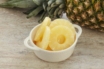 Marinated pineapple rings in the bowl