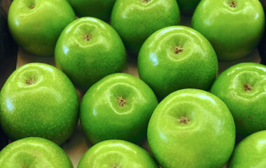 Macro of a group of green apples