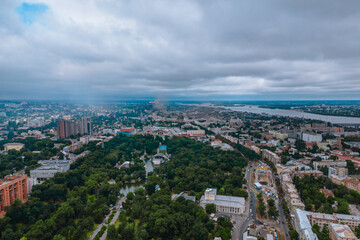 Fototapeta na wymiar Dnipro, Ukraine. View of the central part of the city, the embankment of the Dnieper. Top view from a great height. Panoramic view of the city. Right bank of the city