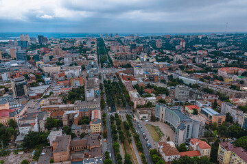 Fototapeta premium Dnipro, Ukraine. View of the central part of the city, the embankment of the Dnieper. Top view from a great height. Panoramic view of the city. Right bank of the city