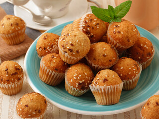 Fototapeta na wymiar Mini cupcakes with seeds.