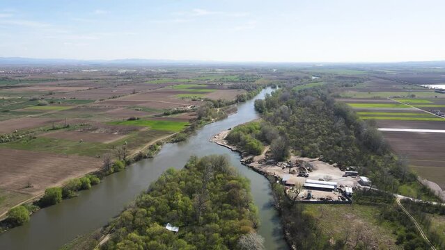 Aerial view of Chepelarska River, pouring into the Maritsa River near city of Plovdiv, Bulgaria