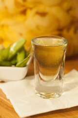 shot served with edamame beans 