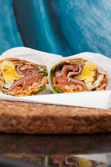 Beef wrap filled with vegetables and sauces 