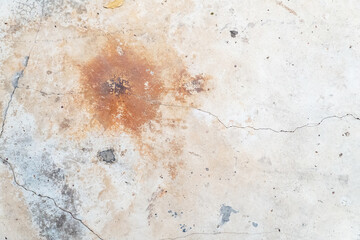 The cement scene has rust stains.
