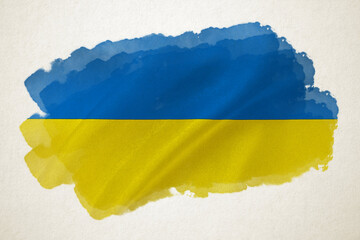 Brush paint art on waving Ukraine flag. Grunge oil paint design. Ukraine - Russia war concept. Stand with Ukraine.