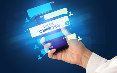 Hand using smartphone with social media concept