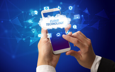Obraz premium Hand using smartphone with cloud technology concept