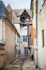 Face of medieval houses in a narrow street of a typical french medieval village and city, bergerac, in France, in the region of Dordogne and Perigord, with typical of Southwestern French architecture