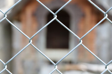 Iron mesh in the animal shelter. Iron fence. Ukraine