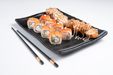 Japanese cuisine. Sushi set of nigiri and maki rolls served. Top view