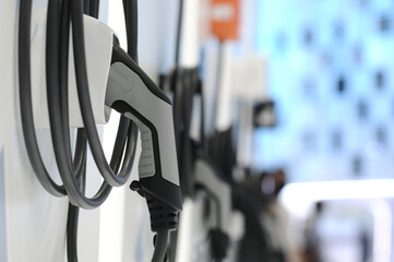 New energy Is electric power for cars Charging a new battery Future car transportation.