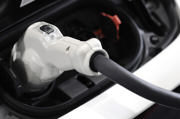New energy Is electric power for cars Charging a new battery Future car transportation.