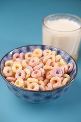 close up of colorful cereal corn flakes in a bowl 