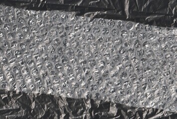 black and white background - close up textured plastic surface 