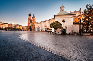 Fototapeta na wymiar St. Mary's basilica in main square of Krakow. Wawel castle. Historic center city with ancient architecture.