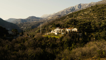 Fototapeta premium The estate is high in the mountains. The house stands on a mountain. Life in the mountains