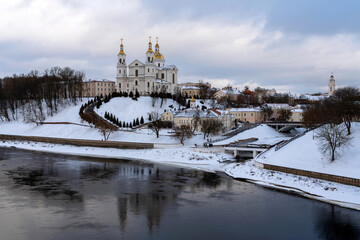 View of the Assumption Mountain, the Holy Spirit Monastery and the Holy Assumption Cathedral on the banks of the Western Dvina and Vitba rivers on a winter day, Vitebsk, Belarus