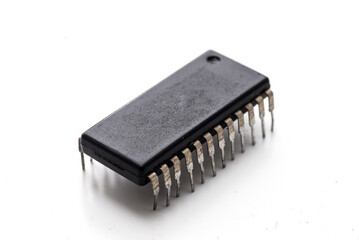 old electronic microcircuit on white background.