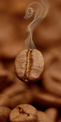 widescreen vertical backdrop - Natural roasted coffee bean close up hovering in frozen motion with hot smoke from heat on blurry background of heap coffee beans. Selective focus, bokeh effect