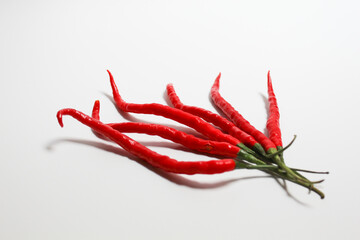 Long thin red chili, isolated on white background