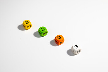 Colorful play dice with numbers on White Background