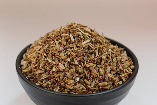 Dried granules of Aniseed, or Pimpinella Anisum seed, or Adas Manis, inside a bowl