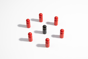 Influencer - Black wooden figure  shows influence and empowerment. Concept of business leadership for a team