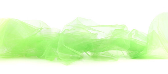 Bright lime green tulle fabric isolated on white background.  Abstract transparent material curve wave on white.