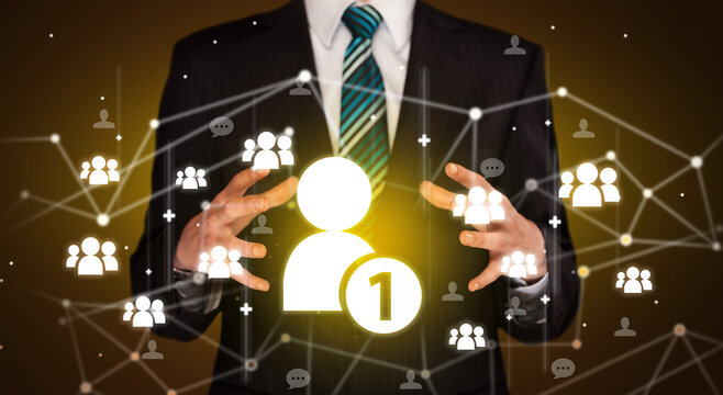 Hand holding social media icons