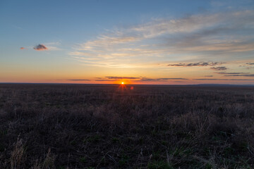 Sunset in the Burtinskaya steppe (Orenburg nature reserve). Orenburg region, Southern Urals, Russia.
