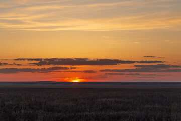 Sunset in the Burtinskaya steppe (Orenburg nature reserve). Orenburg region, Southern Urals, Russia.