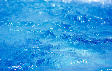 water in swimming pool rippled water