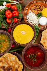 Homemade Romanian Food with 
pies, polenta, borscht, vegetables, fish, meat, stew, cheese and wine. Traditional dishes from Romania and the Republic of Moldova.