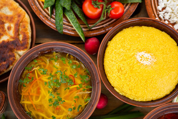 Homemade Romanian Food with 
pies, polenta, borscht, vegetables, fish, meat, stew, cheese and wine. Traditional dishes from Romania and the Republic of Moldova.