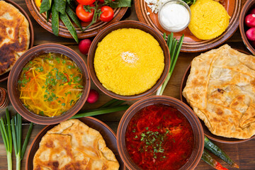 Homemade Romanian Food with 
pies, polenta, borscht, vegetables, fish, meat, stew, cheese and wine. Traditional dishes from Romania and the Republic of Moldova.