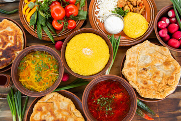 Homemade Romanian Food with 
pies, polenta, borscht, vegetables, fish, meat, stew, cheese and wine. Traditional dishes from Romania and the Republic of Moldova.