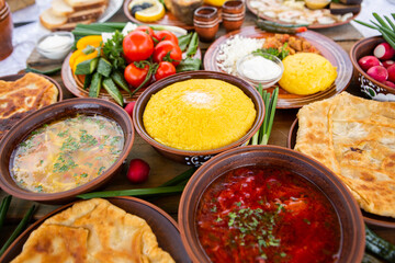 Homemade Romanian Food with 
pies, polenta, borscht, vegetables, fish, meat, stew, cheese and wine. Traditional dishes from Romania and the Republic of Moldova.