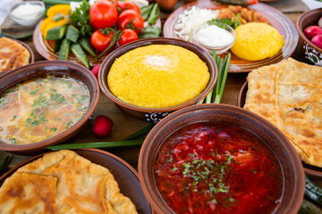 Homemade Romanian Food with 
pies, polenta, borscht, vegetables, fish, meat, stew, cheese and wine. Traditional dishes from Romania and the Republic of Moldova.