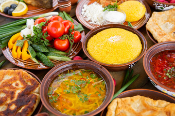 Homemade Romanian Food with 
pies, polenta, borscht, vegetables, fish, meat, stew, cheese and wine. Traditional dishes from Romania and the Republic of Moldova.