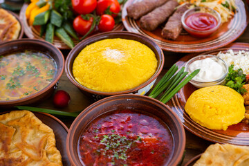 Homemade Romanian Food with 
pies, polenta, borscht, vegetables, fish, meat, stew, cheese and wine. Traditional dishes from Romania and the Republic of Moldova.