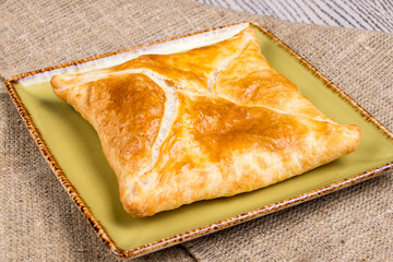 khachapuri layered georgian kitchen, penovani, on wooden table