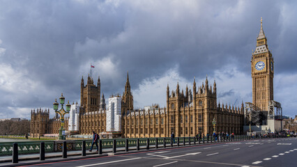 Parliament building and Big Ben in London. A view from the bridge.