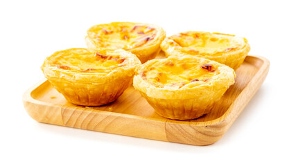 Egg tart on wooden plate isolated on white background