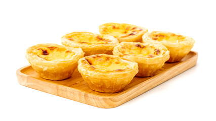 Egg tart on wooden plate isolated on white background