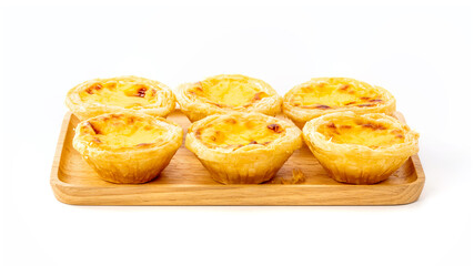 Egg tart on wooden plate isolated on white background