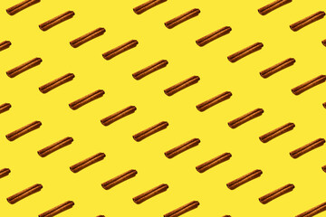 Cinnamon pattern on yellow background.