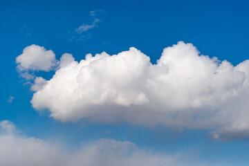 Cumulus clouds. Background with white clouds. Picture for weather forecast.